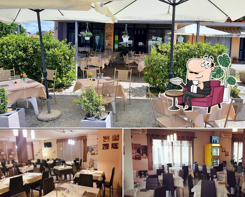 Siediti a un tavolo di La Perla Nera Ristorante Pizzeria