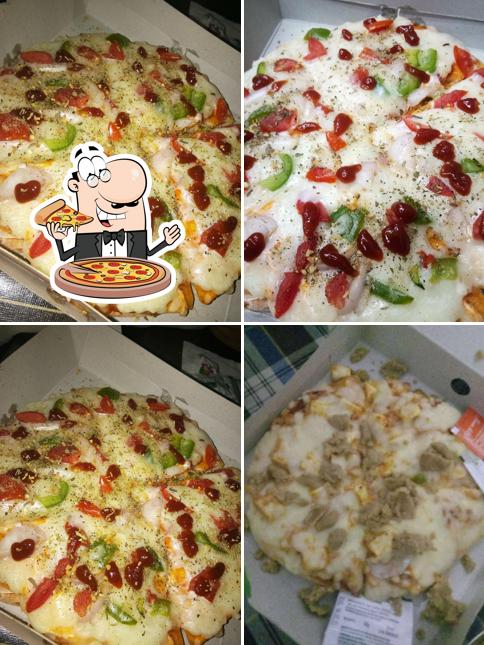 Order pizza at Navd's Yummy Cafe