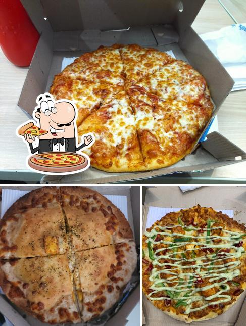 Try out pizza at Domino's Pizza