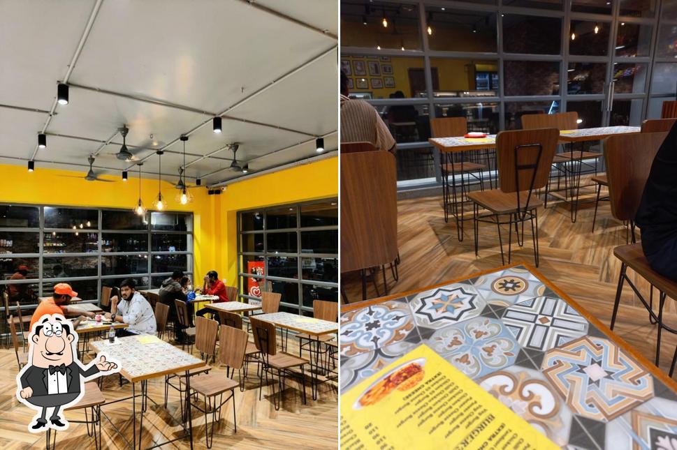 Take a seat at one of the tables at Bake Zone Bakery&Lounge