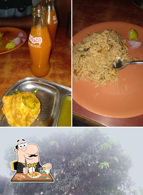 Among different things one can find food and alcohol at Hotel Abhishek