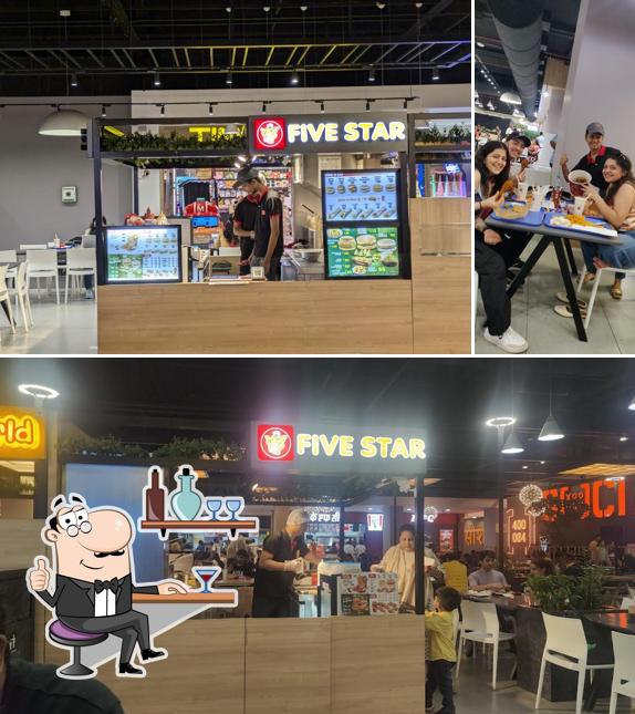 The interior of Five Star Chicken Orlem