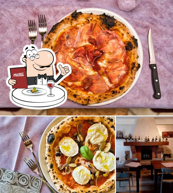 Tra le diverse cose da La Posta - Trattoria Pizzeria si possono trovare la cibo e interni