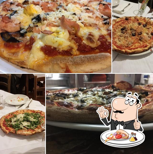 A Le Cisterne & Villa Le Cisterne Giarre, puoi goderti una bella pizza