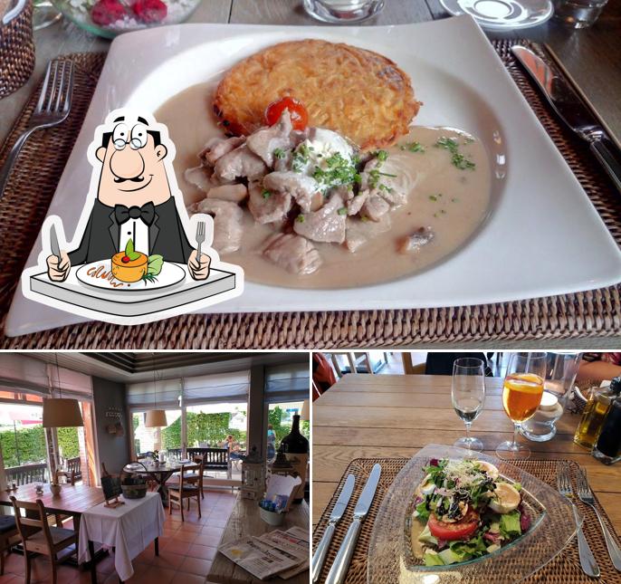 La cibo e tavolo da pranzo del ristorante