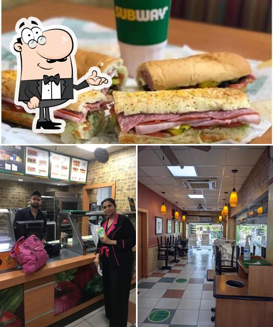 This is the image displaying interior and sandwich at Subway Restaurant
