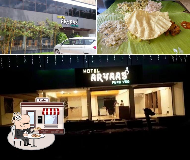This is the picture showing exterior and food at ARYAAS restaurant