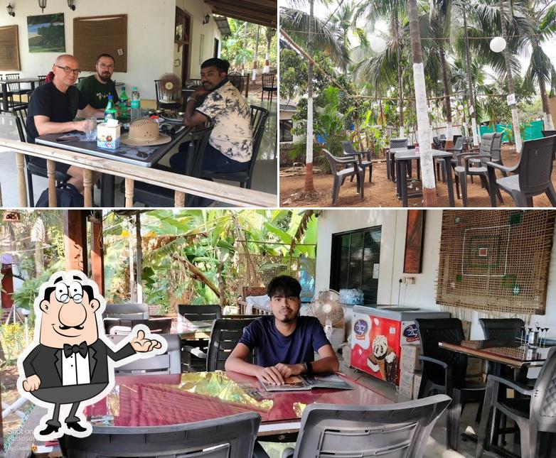 The interior of Neel Garden Restaurant And Cottages