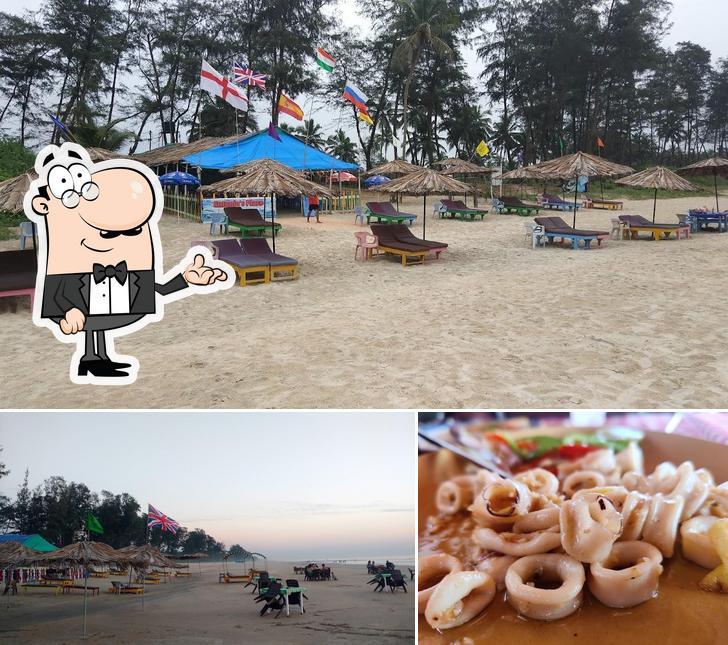 Check out the photo showing interior and food at Antonio's Place Beach Shack