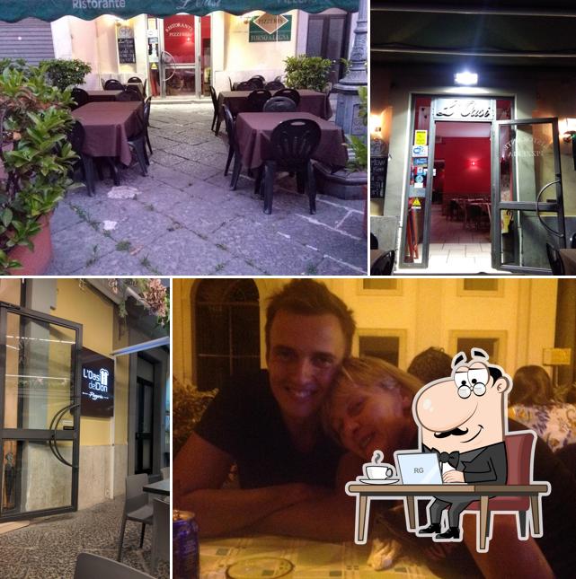 Questa è la foto che raffigura la interni e tavolo da pranzo di L'Oasi del Don