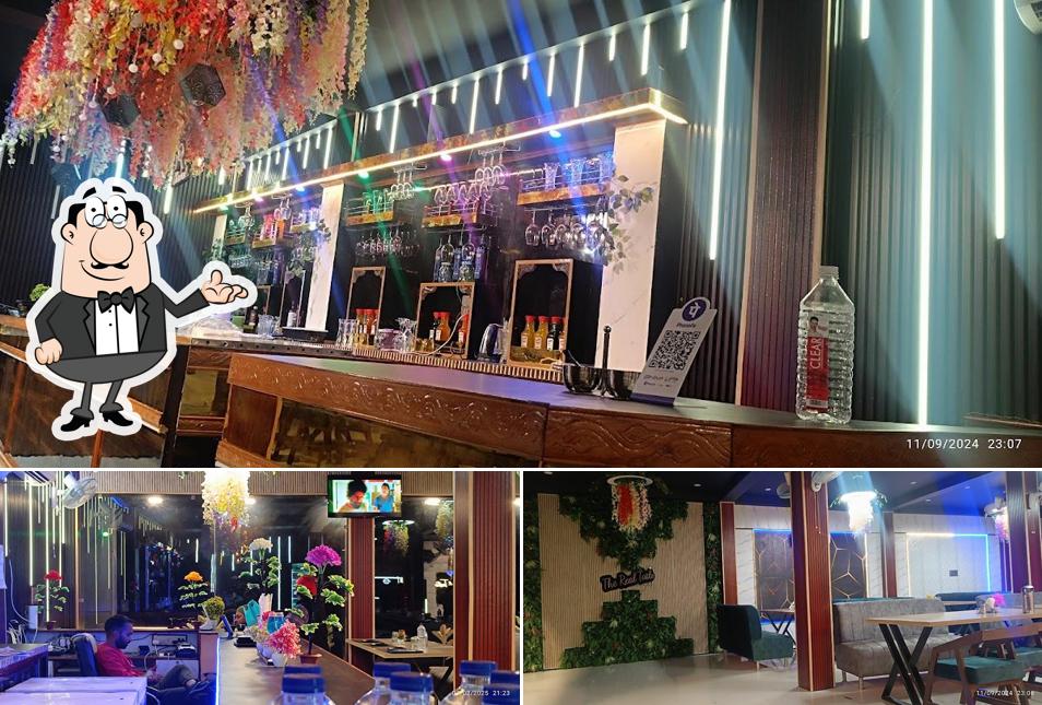 Take a seat at one of the tables at Real Taste Restaurant & Cafe