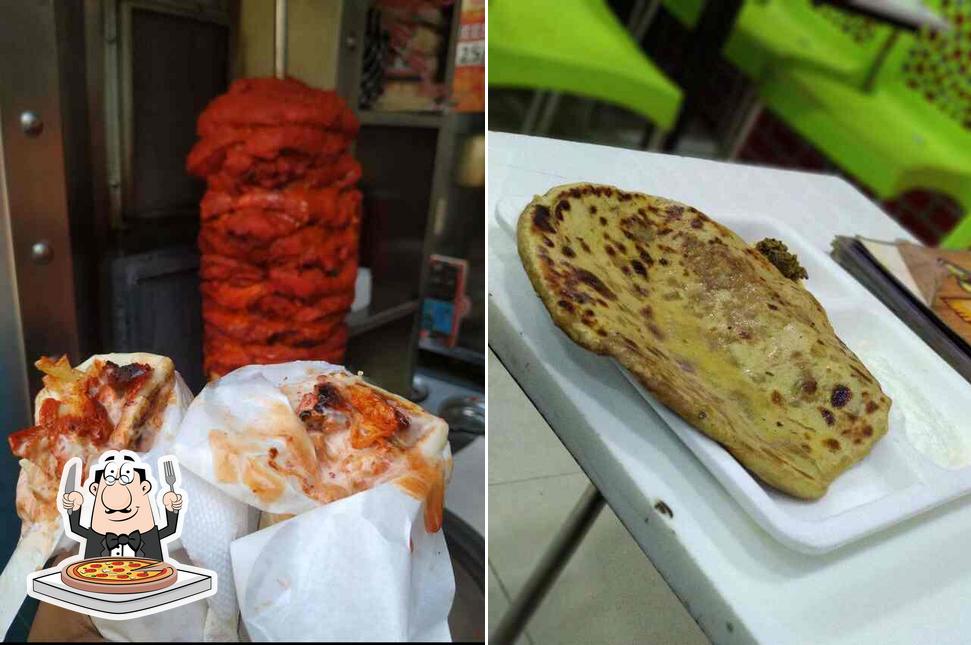 Get pizza at Ambarsaria Fast Food Corner