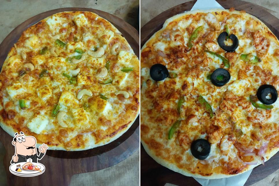 Pick pizza at Meat & Eat family restaurant