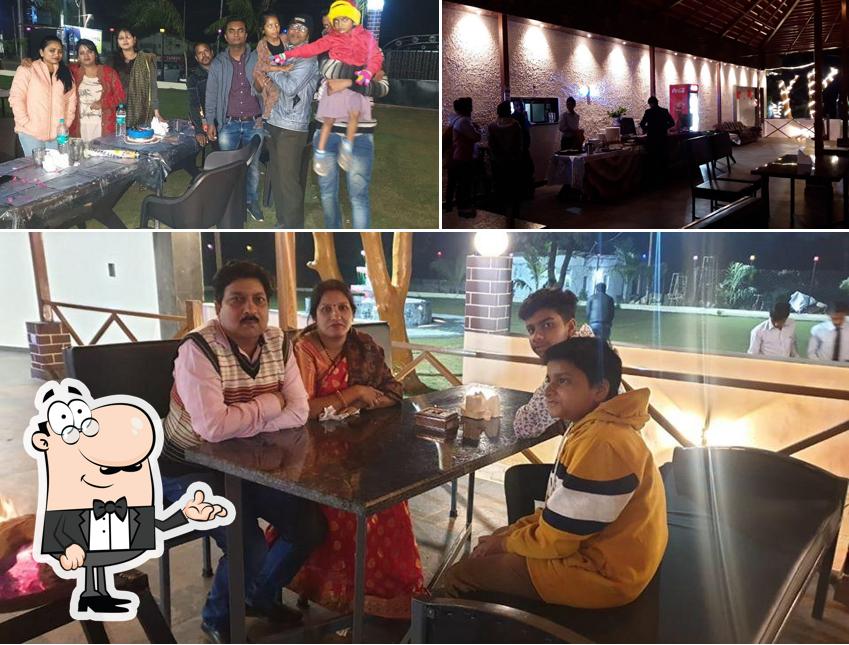 Take a seat at one of the tables at ATITHI RESTAURANT & PARTY LAWN Take a seat at one of the tables at ATITHI RESTAURANT & PARTY LAWN