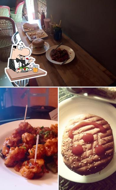 This is the image depicting food and dining table at RAVCAPT CAFE This is the image depicting food and dining table at RAVCAPT CAFE