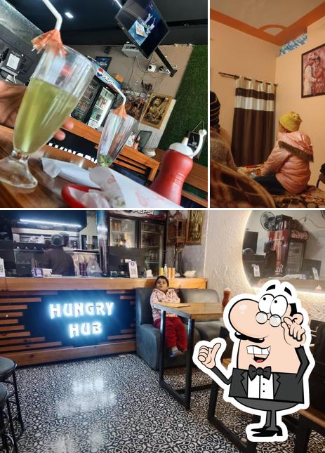 This is the picture displaying interior and food at Hungry hub