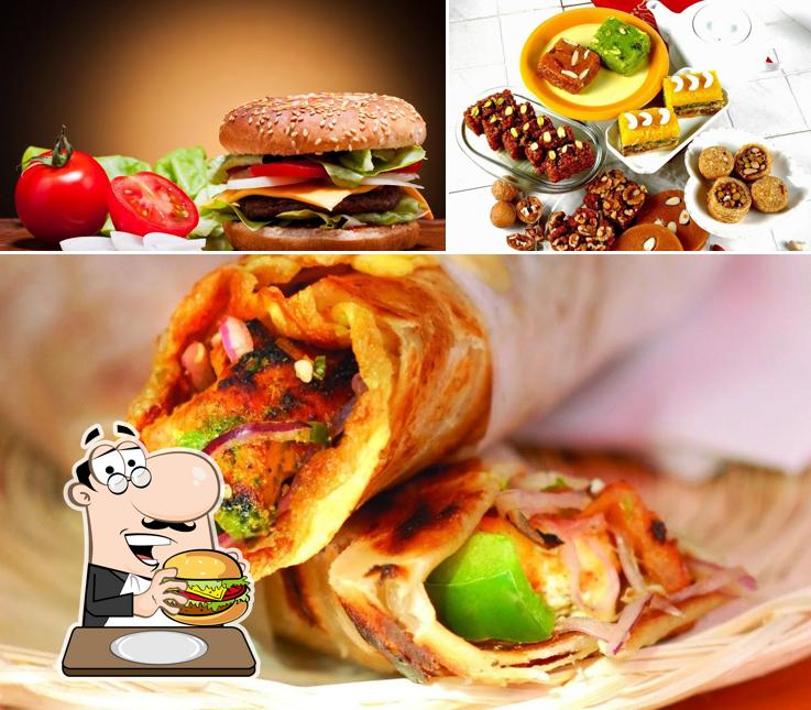 Get a burger at Maa Restaurant & Sweets (Pure Vegetarian) - Biggest Family Restaurant of Noida extension