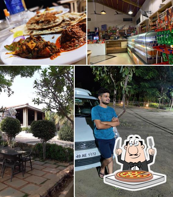 Try out pizza at Rajkamal Inn - Family Garden Restaurant & Dhaba