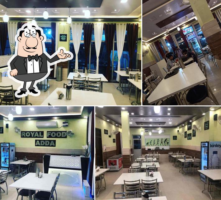 Take a seat at one of the tables at Royal food adda