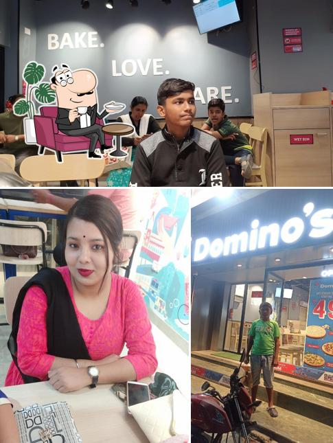 This is the photo showing interior and exterior at Domino's Pizza