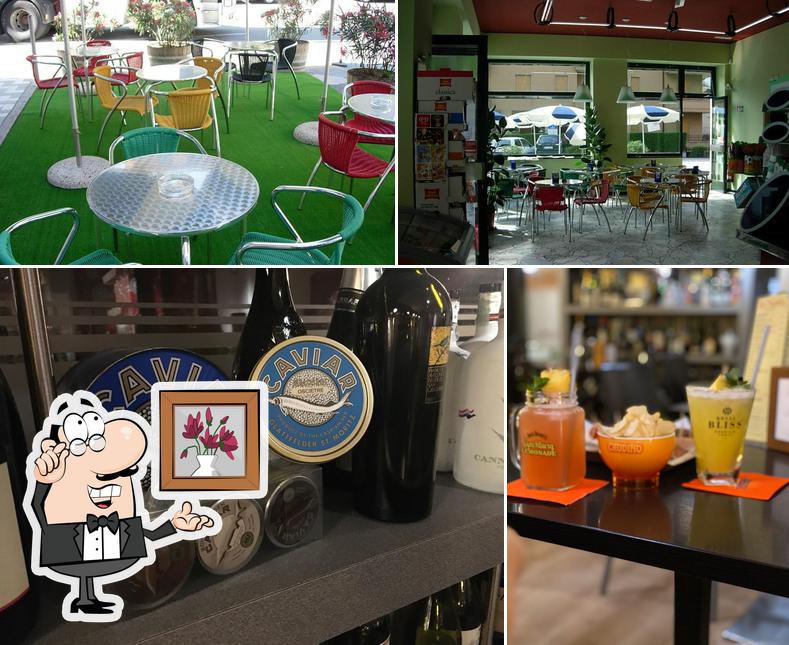 Dai un’occhiata alla foto che presenta la interni e bevanda di Bar Total