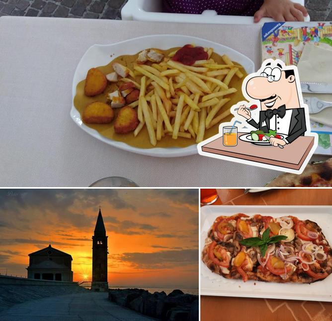 Questa è la foto che presenta la cibo e esterno di CARILLON