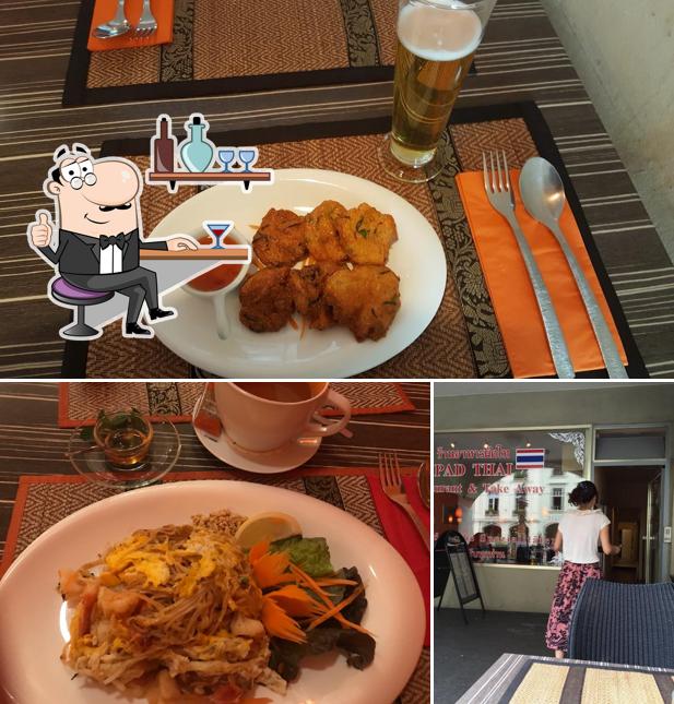 Pad Thai Restaurant und Take Away si caratterizza per la interni e cibo