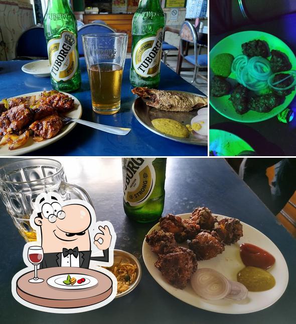 Check out the picture showing food and beer at Jollite Bar Cum Resturant