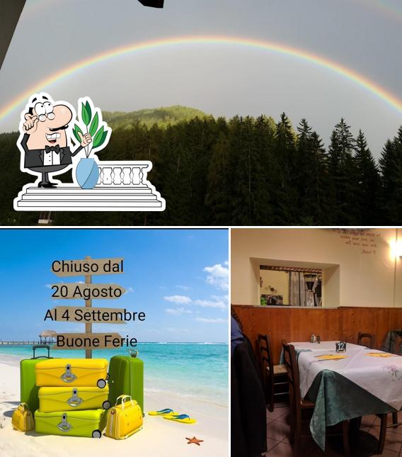 Ristorante Pizzeria Da Libero si caratterizza per la esterno e tavolo da pranzo
