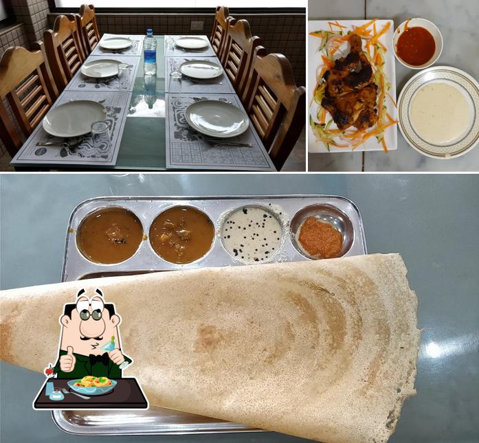 Among various things one can find food and dining table at White Way Restaurant & Bakes