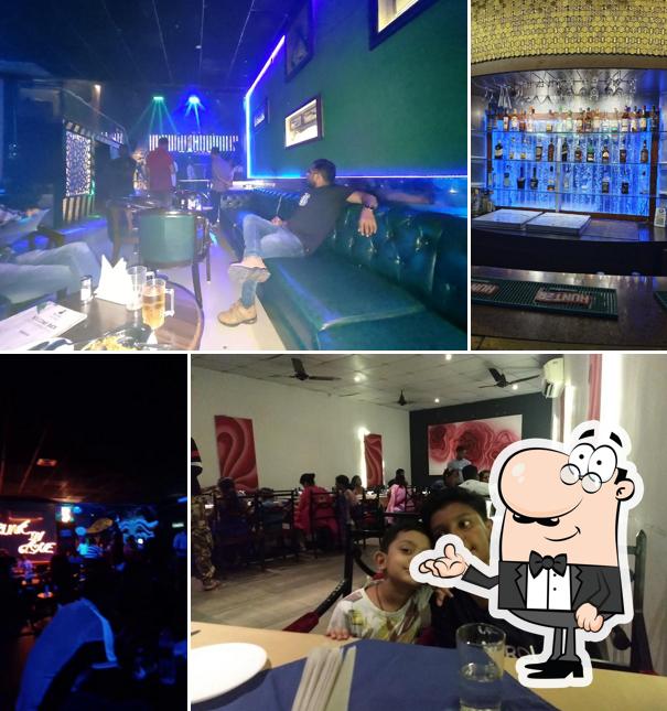 Take a seat at one of the tables at Black Mamba