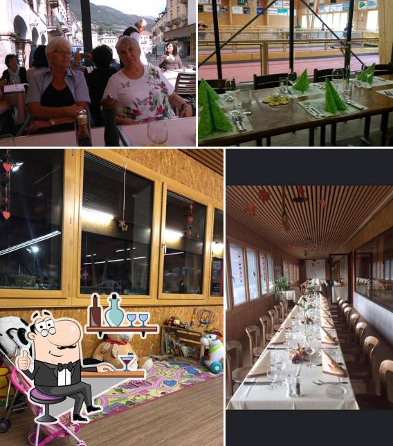 Siediti a un tavolo di Restaurant Pallino