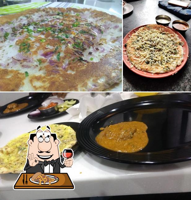 Get pizza at Smile Veg Restaurant