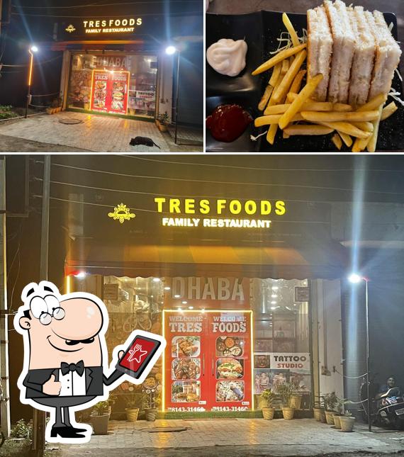 This is the image showing exterior and food at Tres foods