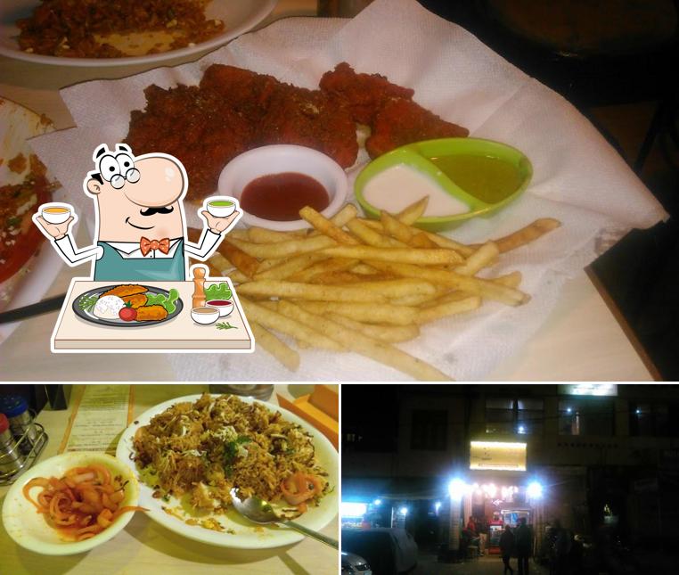 Check out the picture displaying food and exterior at The Khurana's Kitchen