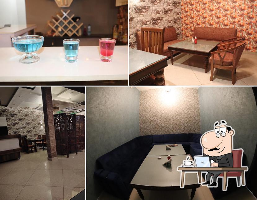 Take a seat at one of the tables at Golden Taste Restaurant & Beer Bar