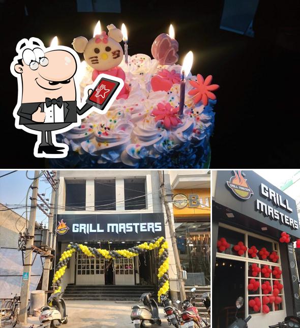 Take a look at the photo displaying exterior and cake at Grill Masters Moga