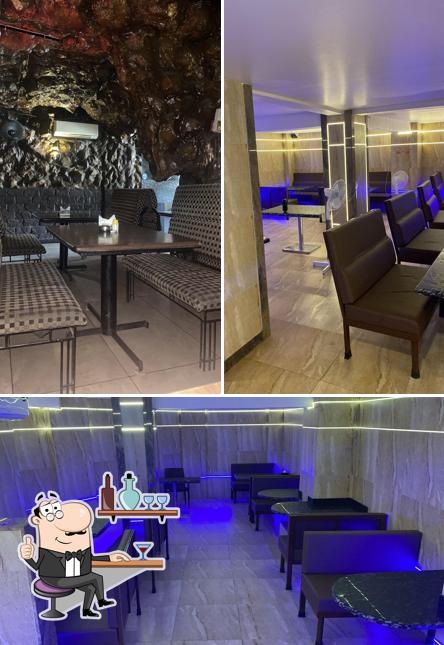 Take a seat at one of the tables at The Caves Family Restaurant & Bar