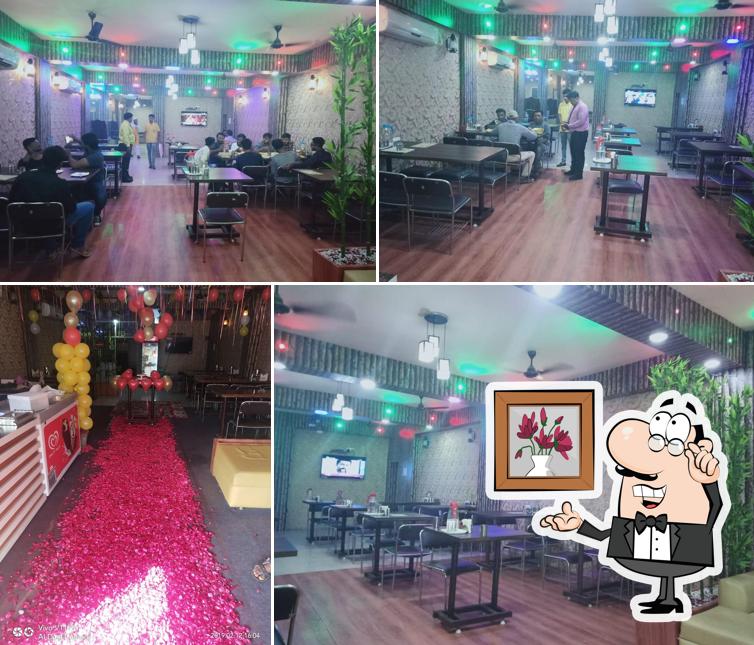 Take a seat at one of the tables at Foodies Restaurant