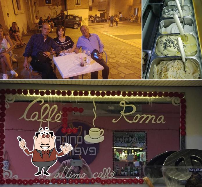 Tra le varie cose da Caffè Roma 52 si possono trovare la cibo e tavolo da pranzo