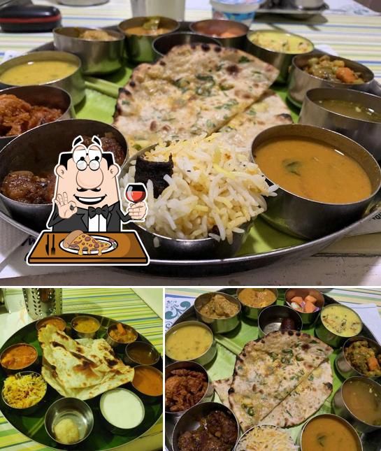 Try out pizza at Dwaraka A/c Veg. Restaurant & Tiffins - Hotel Rukmini Reviera