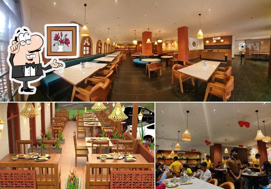 Take a seat at one of the tables at Nashik Lunch Home