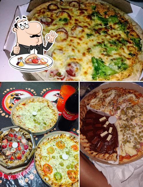 No Pizzaria Realeza - Parque Doroteia, você pode degustar pizza