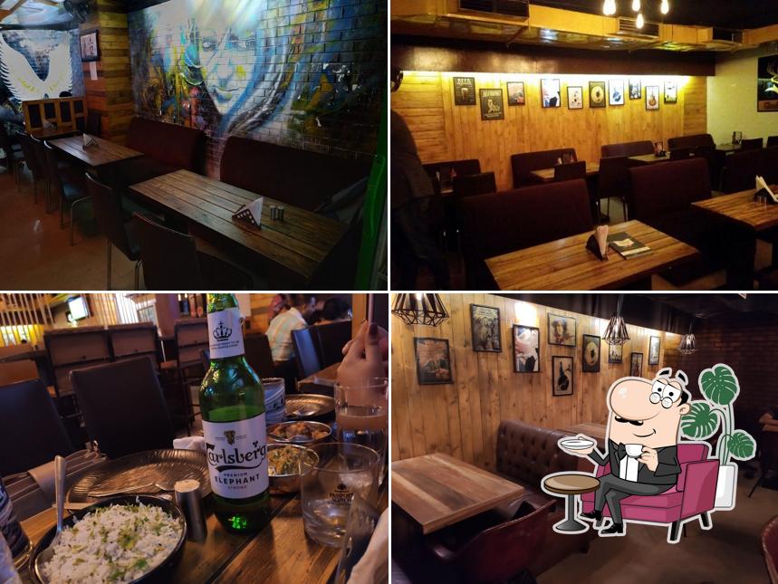 Take a seat at one of the tables at Bistro Y, Restro Pub