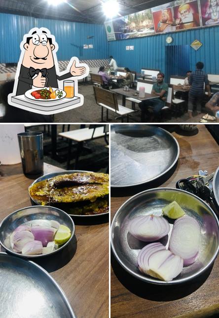 The photo of Hotel Himachal Punjab’s food and interior