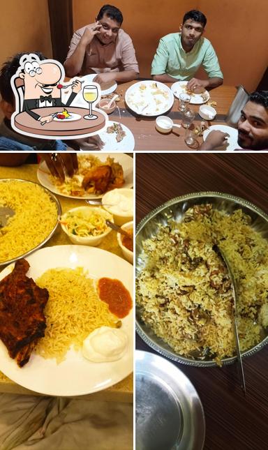 Check out the image showing food and interior at Al Raydan