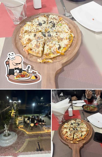 Try out pizza at The Lake view resort bhinmal