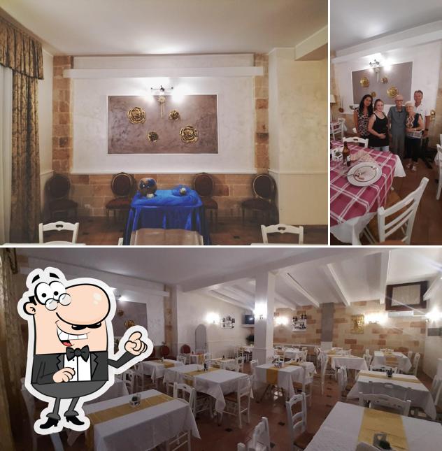 Dai un'occhiata agli interni di Trattoria Pizzeria La Strettula