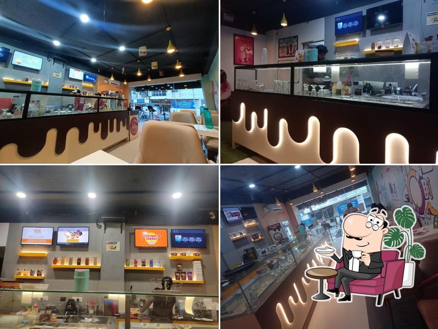 Take a seat at one of the tables at Cream and Fudge