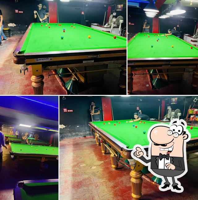 Check out how CUE CAN DO SNOOKER CLUB AND CAFE looks inside